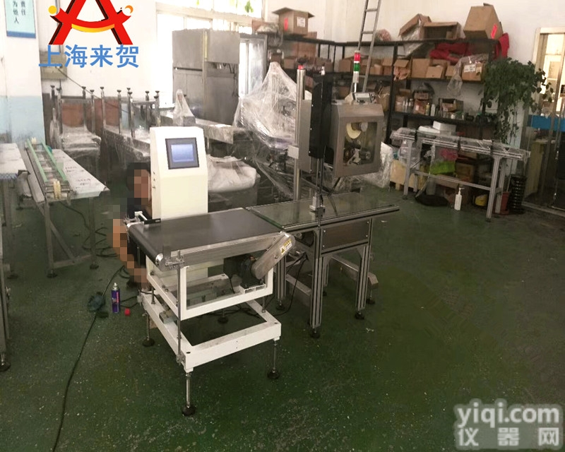 <em>称重</em><em>贴标机</em>  一种<em>在线式</em>全自动<em>称重</em><em>贴标机</em>来贺Pai