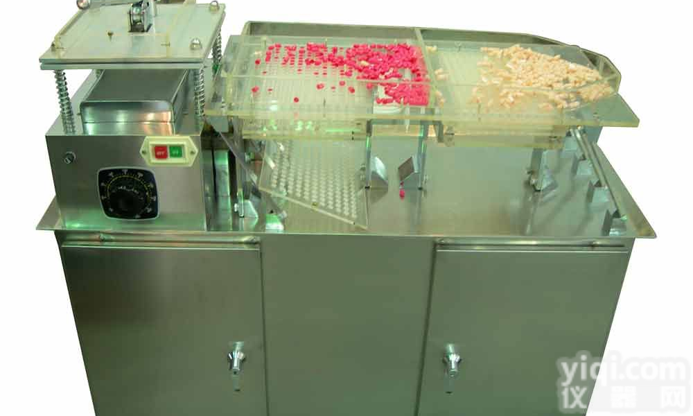 <em>胶囊充填机</em>